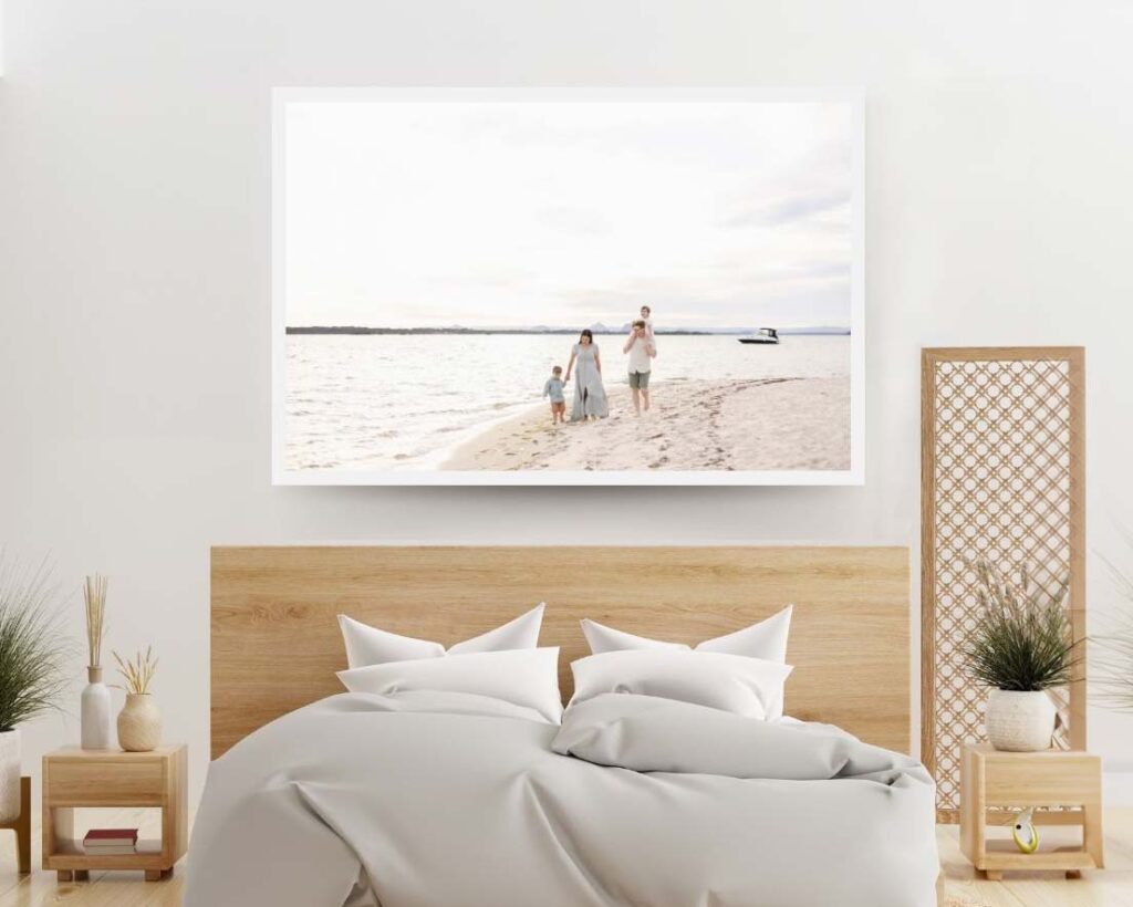 Photo of family on beach, framed and display in a bedroom. Sharon Joseph Photography, Brisbane Family Photographer.