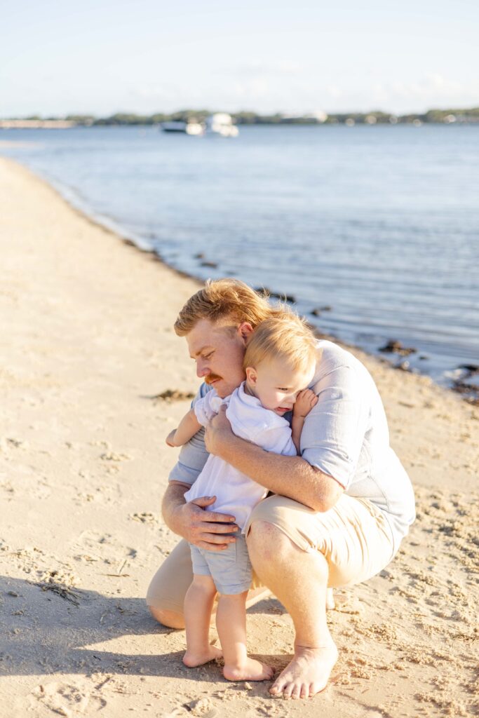 A sweet hug between dad and toddler boy. Brisbane family photography.