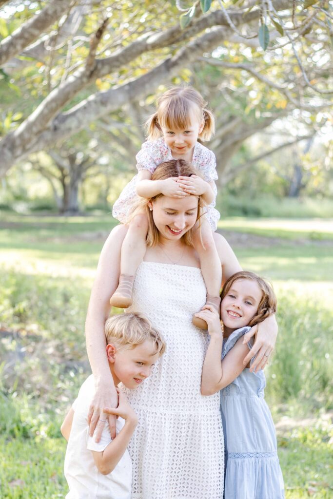 White and blue photoshoot outfits. Brisbane Family Photographer. Sharon Joseph