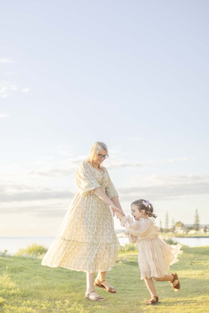 Fun mum and daughter photo | Sunrise Beach Photoshoot in Scarborough Brisbane | Sharon Joseph Photography